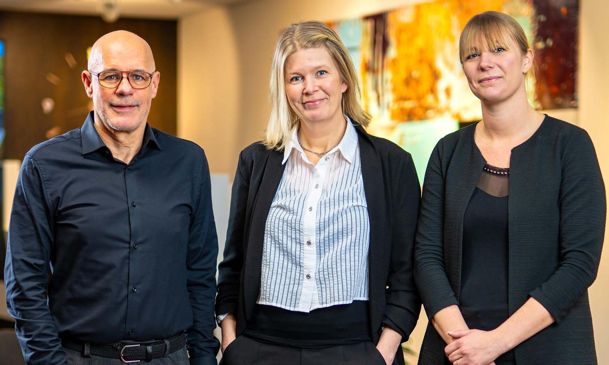 Tre rådgivare på bankkontoret